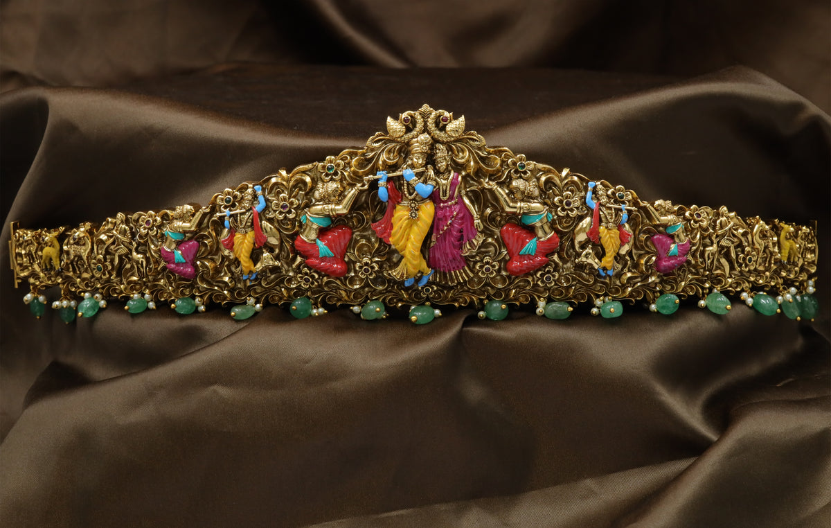 Krishna Radha Dabu with sculpted figures, ornate scrollwork and traditional detailing