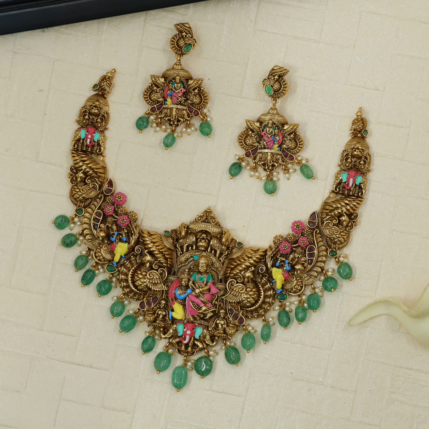 Antique Krishna Radha necklace with peacock framing and sculpted deity work