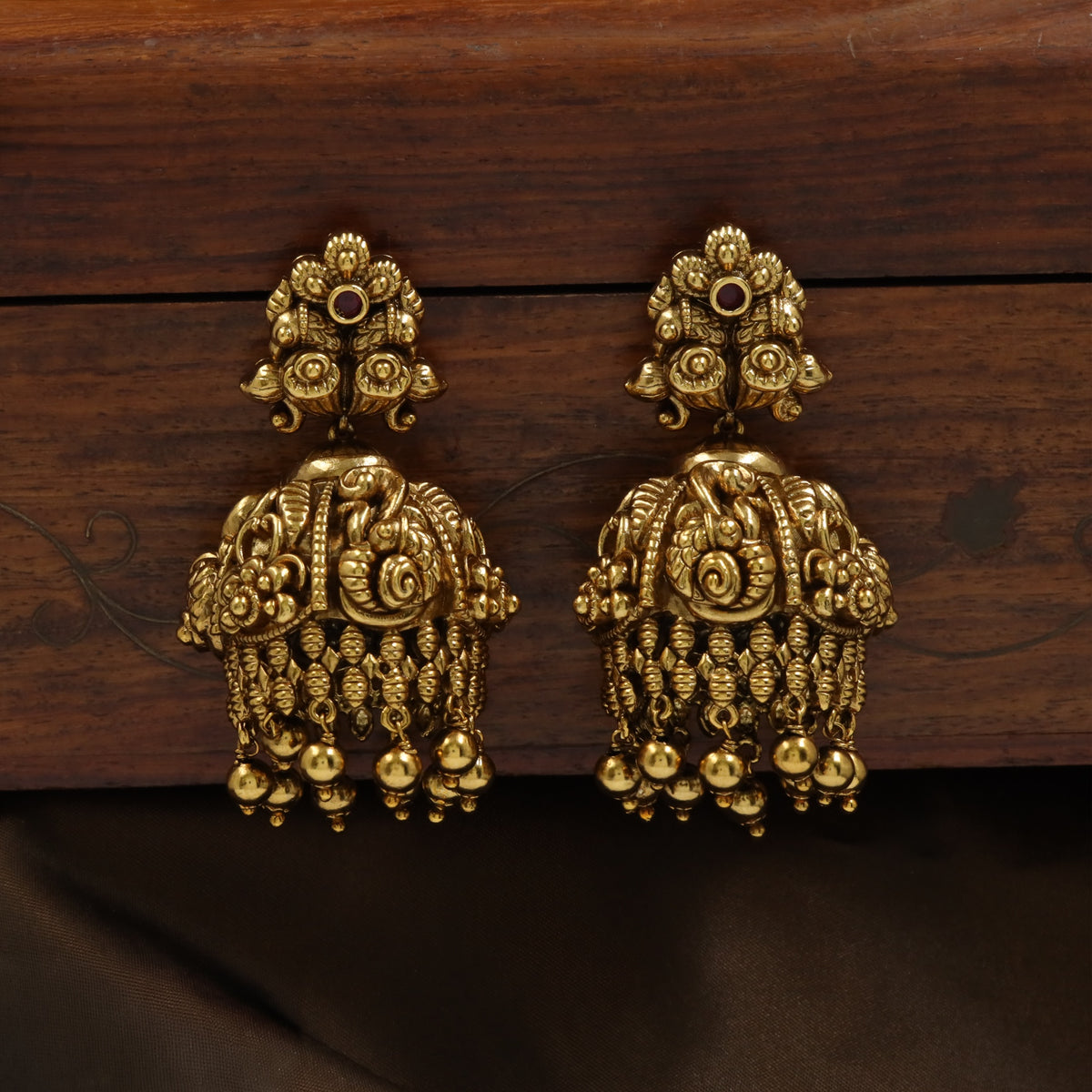 Regal Antique Jumka Earrings With Textured Drop Accents