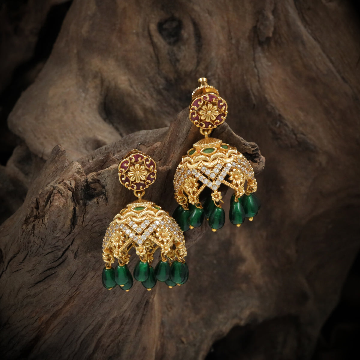 Ornamental Antique Jumka Featuring Floral Studs and Arched Panels
