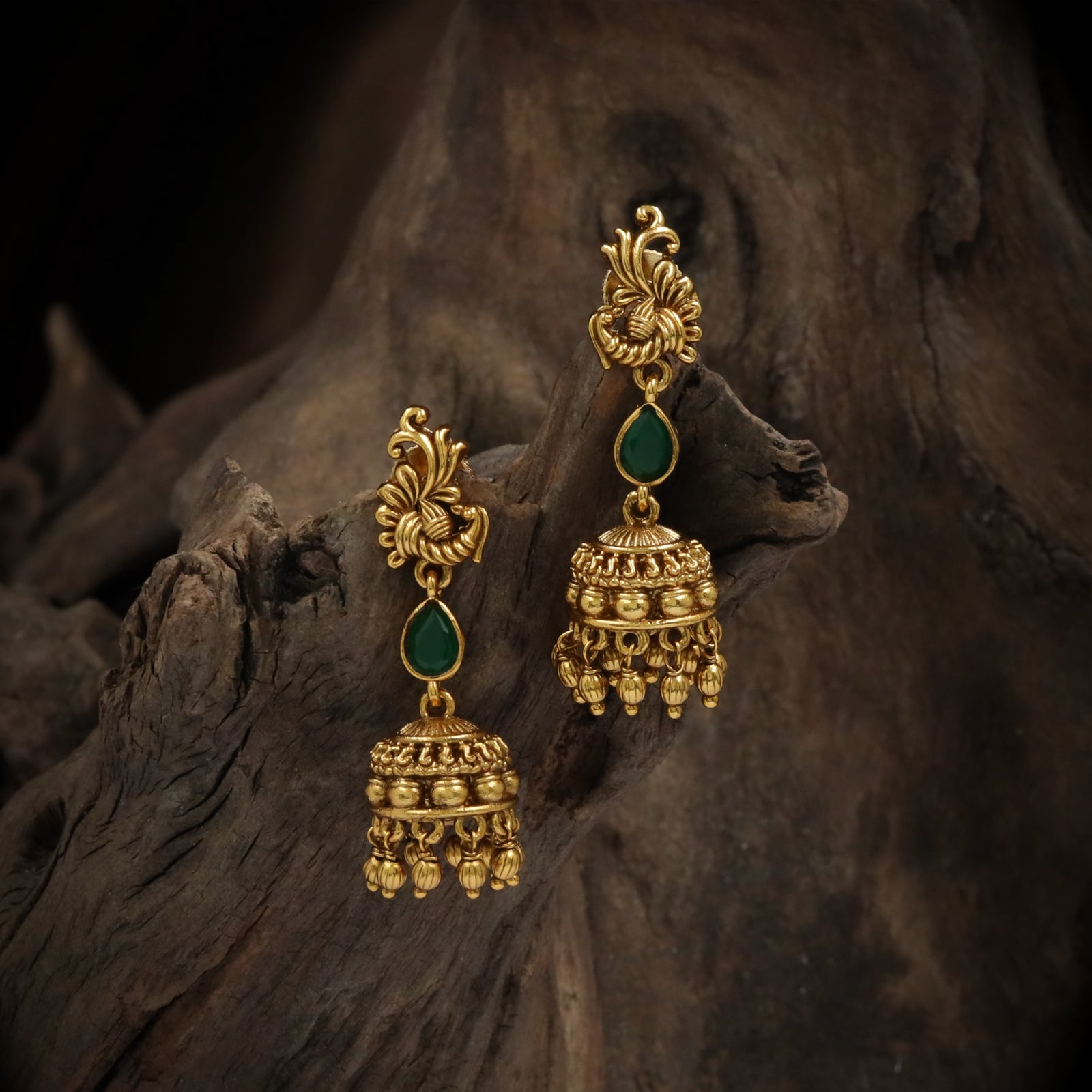 Antique-Finish Gold Jhumka with Scroll Motif & Green Drop Accent
