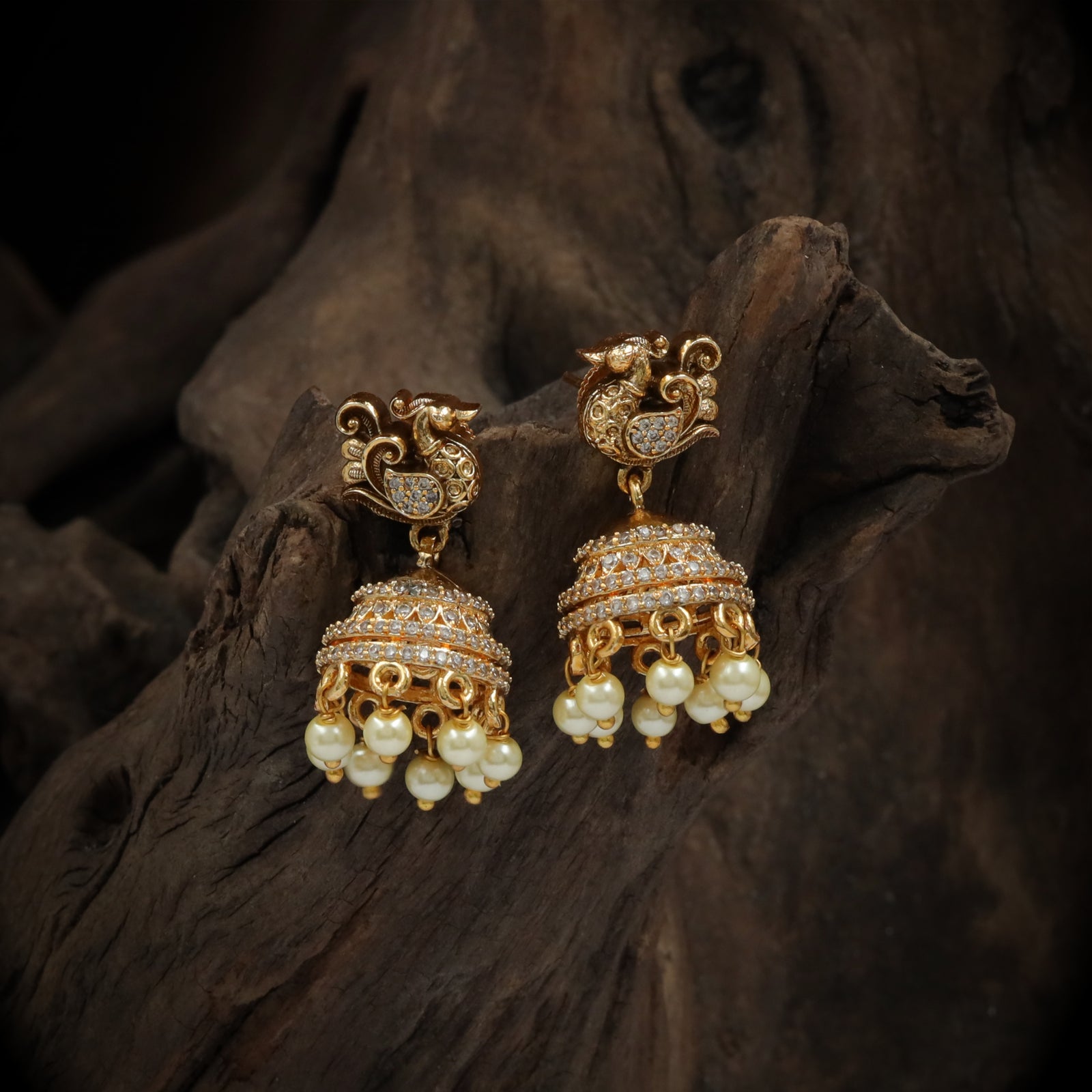 Antique-Finish Gold Jhumka with Peacock Motif & Pearl Drops
