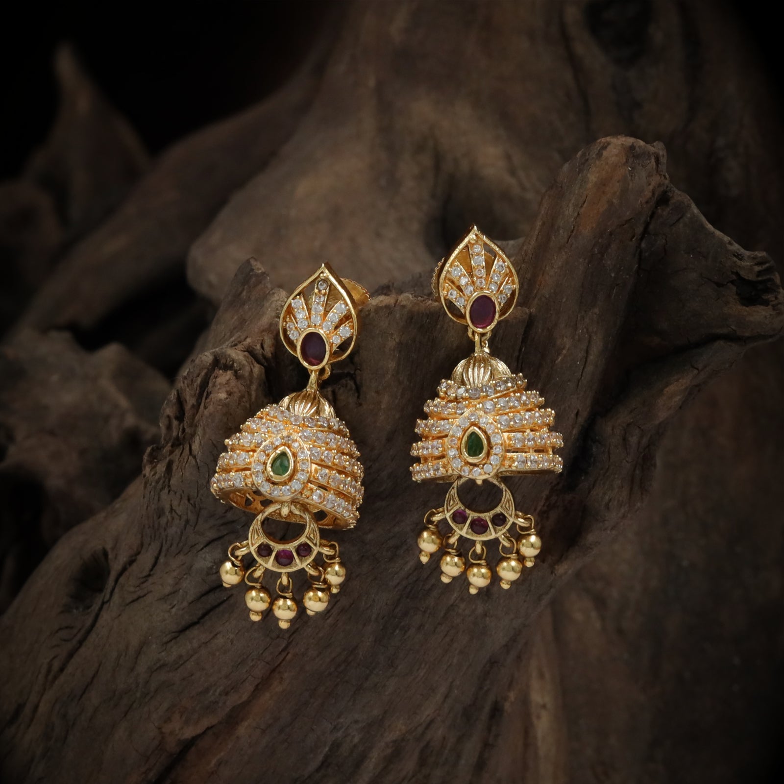 Antique-Finish Gold Jhumka with Leaf Stud & Dome