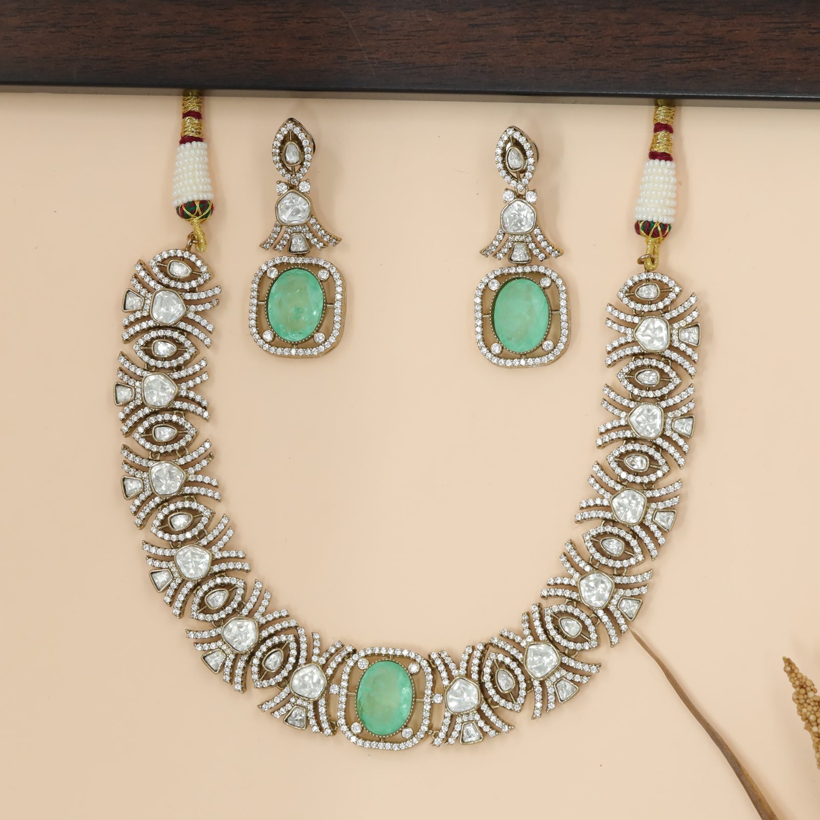 Structured Necklace with Repeating Eye-Shaped Motif Construction