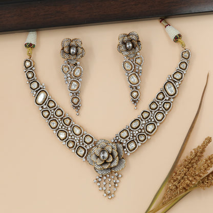 Sculpted Necklace with Floral Center and Linked Motif Bands