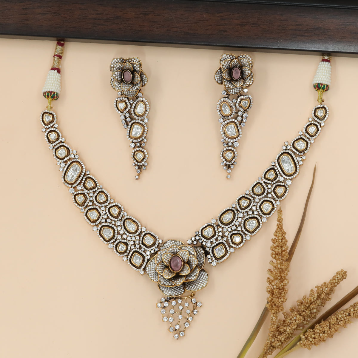 Sculpted Necklace with Floral Center and Linked Motif Bands