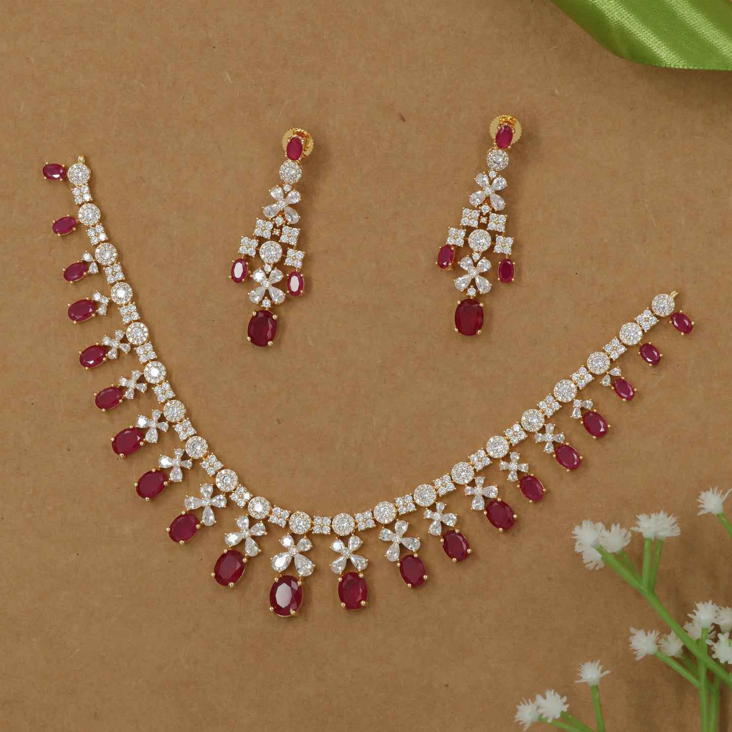 Heritage-Style Necklace with Repeating Flower Motifs and Pendant Rhythm