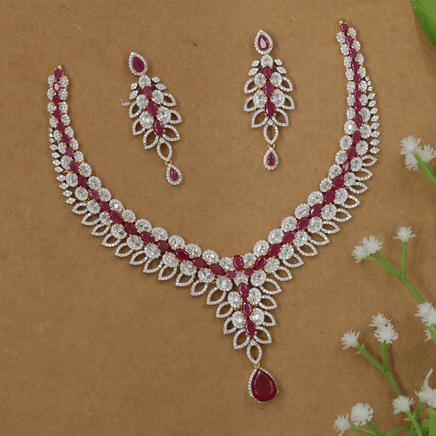 Contoured Necklace with Repeating Leaf Loops and Center Fall