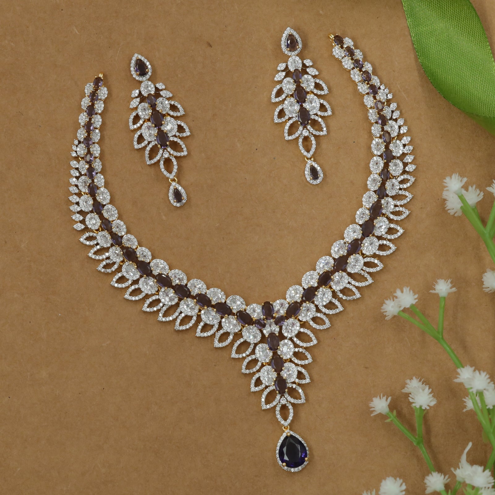 Contoured Necklace with Repeating Leaf Loops and Center Fall