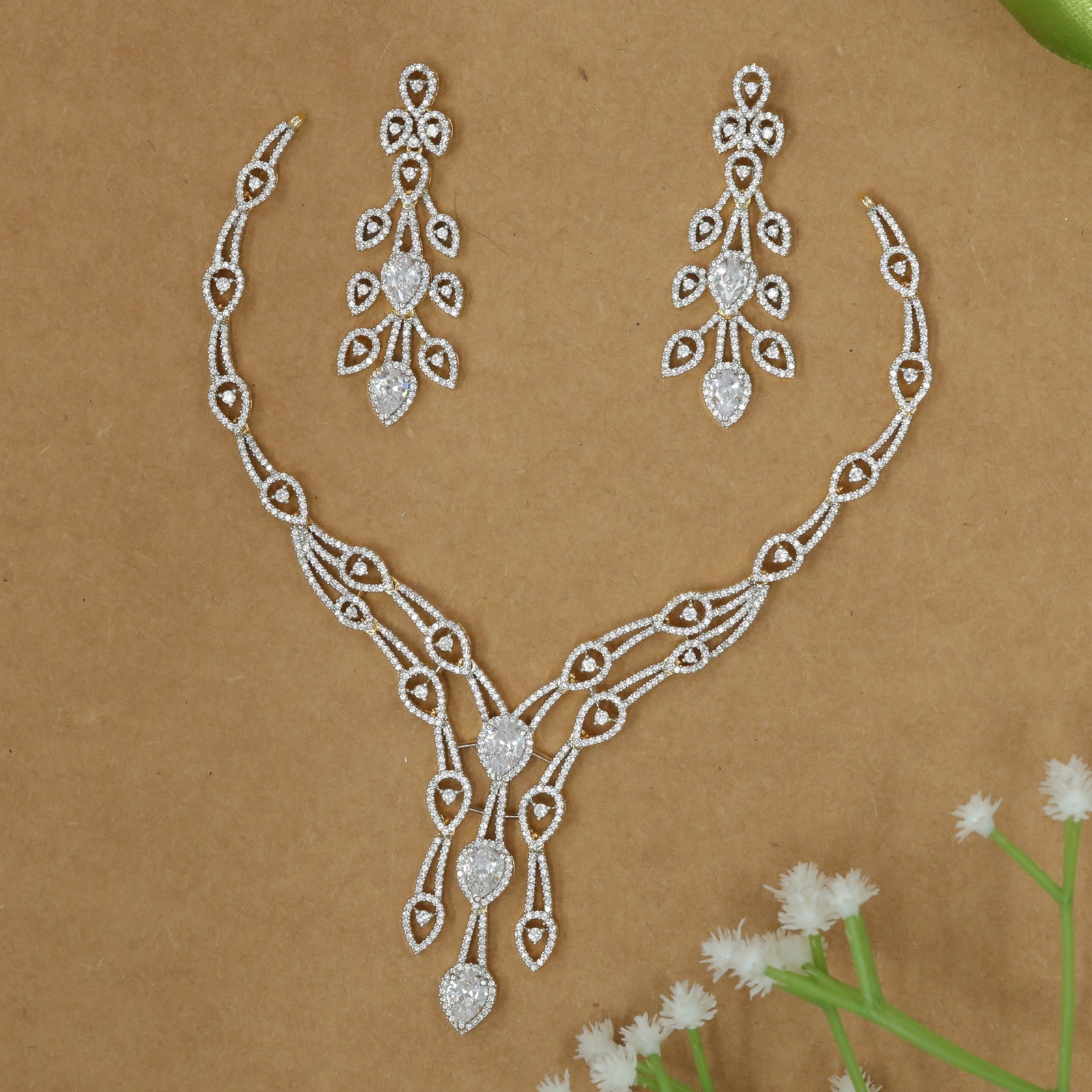 Graceful Leaf Motif Diamond-Style Necklace Set with Flowing Drop Design