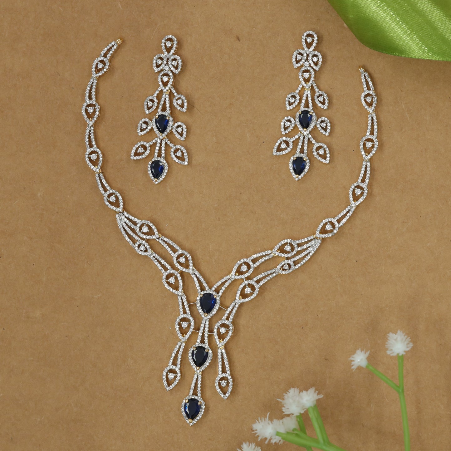 Graceful Leaf Motif Diamond-Style Necklace Set with Flowing Drop Design