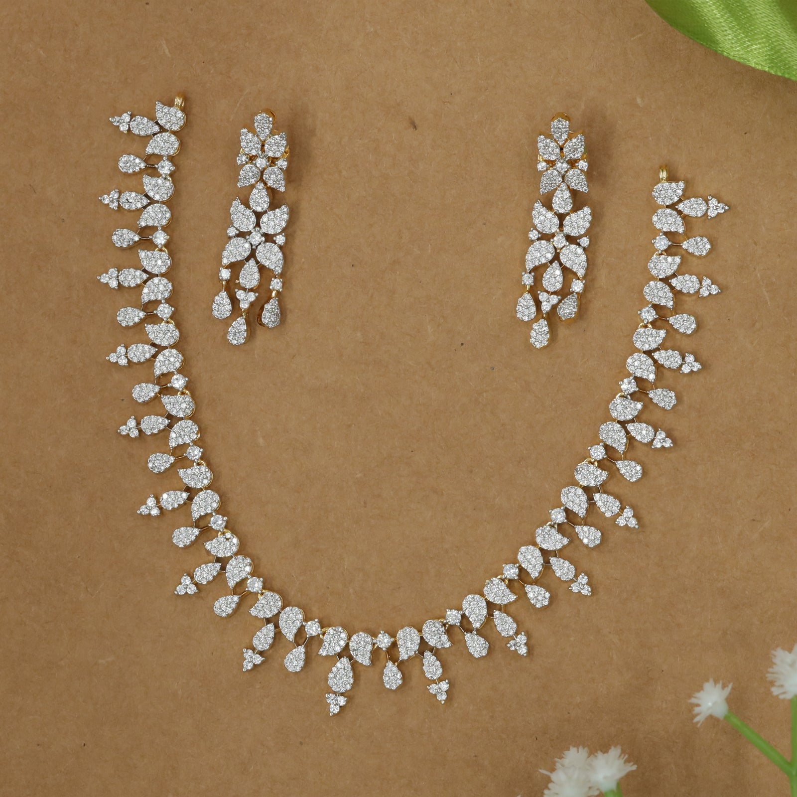Cascading Leaf Cluster Necklace with Soft Tapered Flow