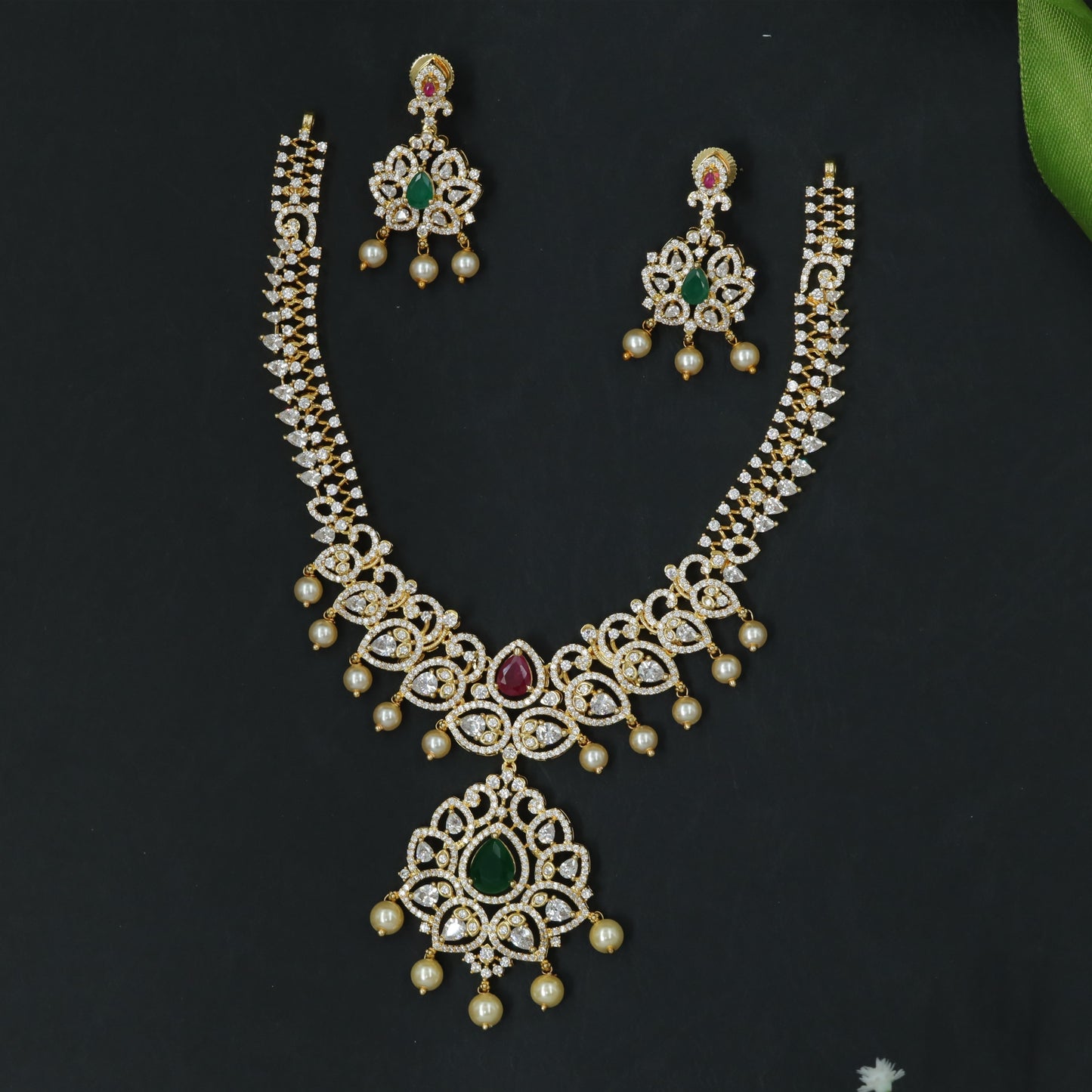 Stone-Rich Necklace with Central Drop Pendant and Fringe Accents
