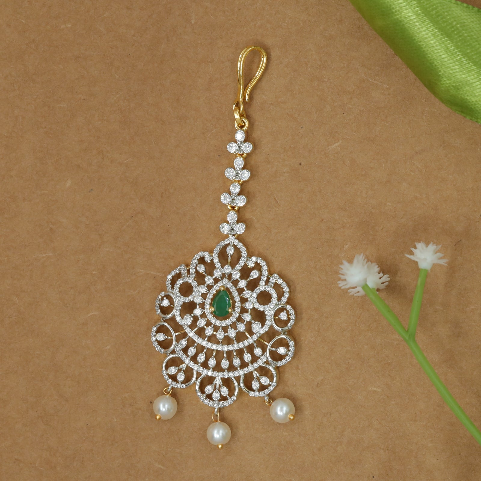 Detailed Lattice Flower Design Tikka with Balanced Pearl Ends