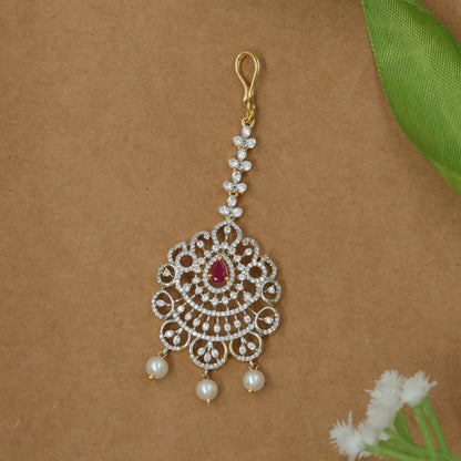 Detailed Lattice Flower Design Tikka with Balanced Pearl Ends