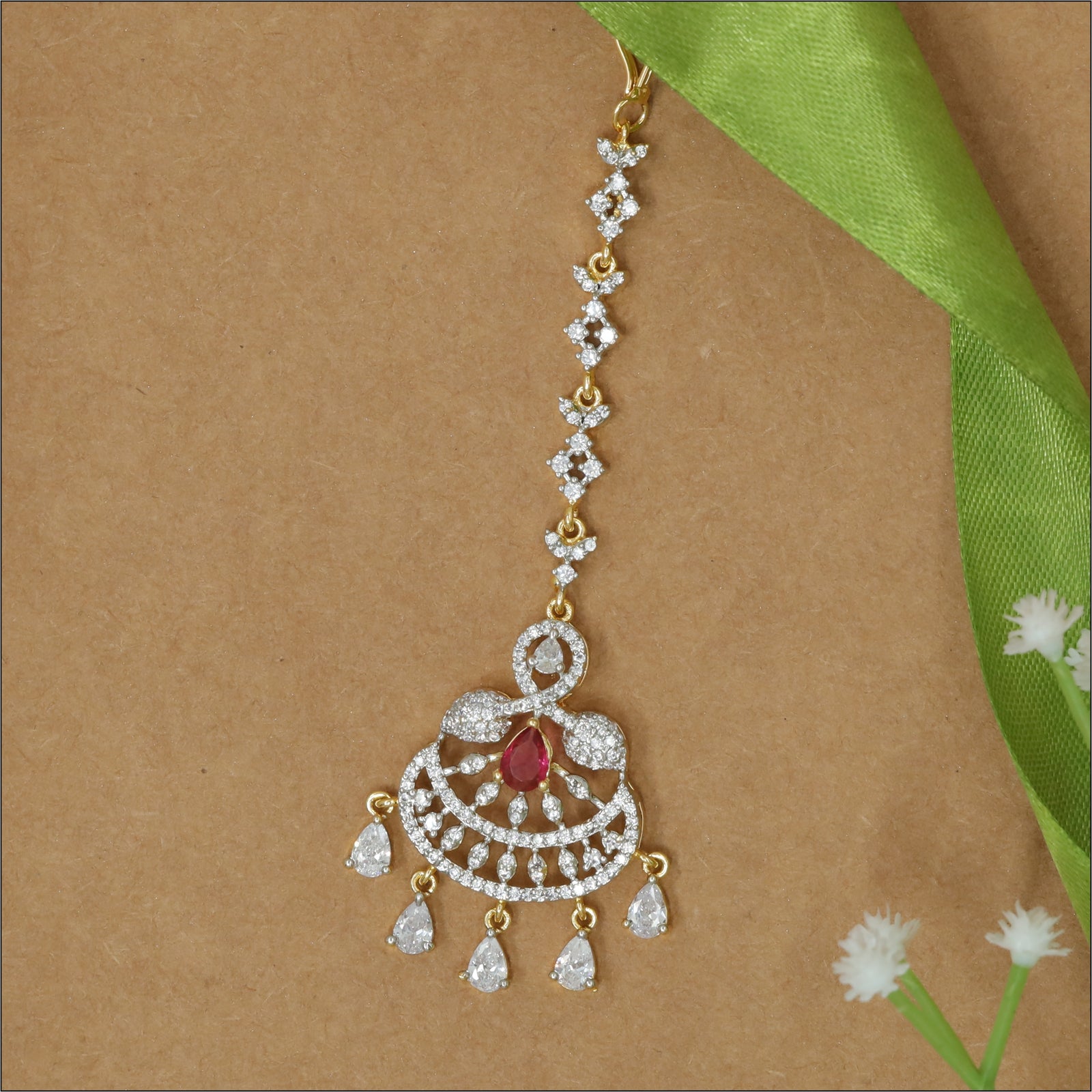 Contemporary Long Tikka with Arched Drop Detail