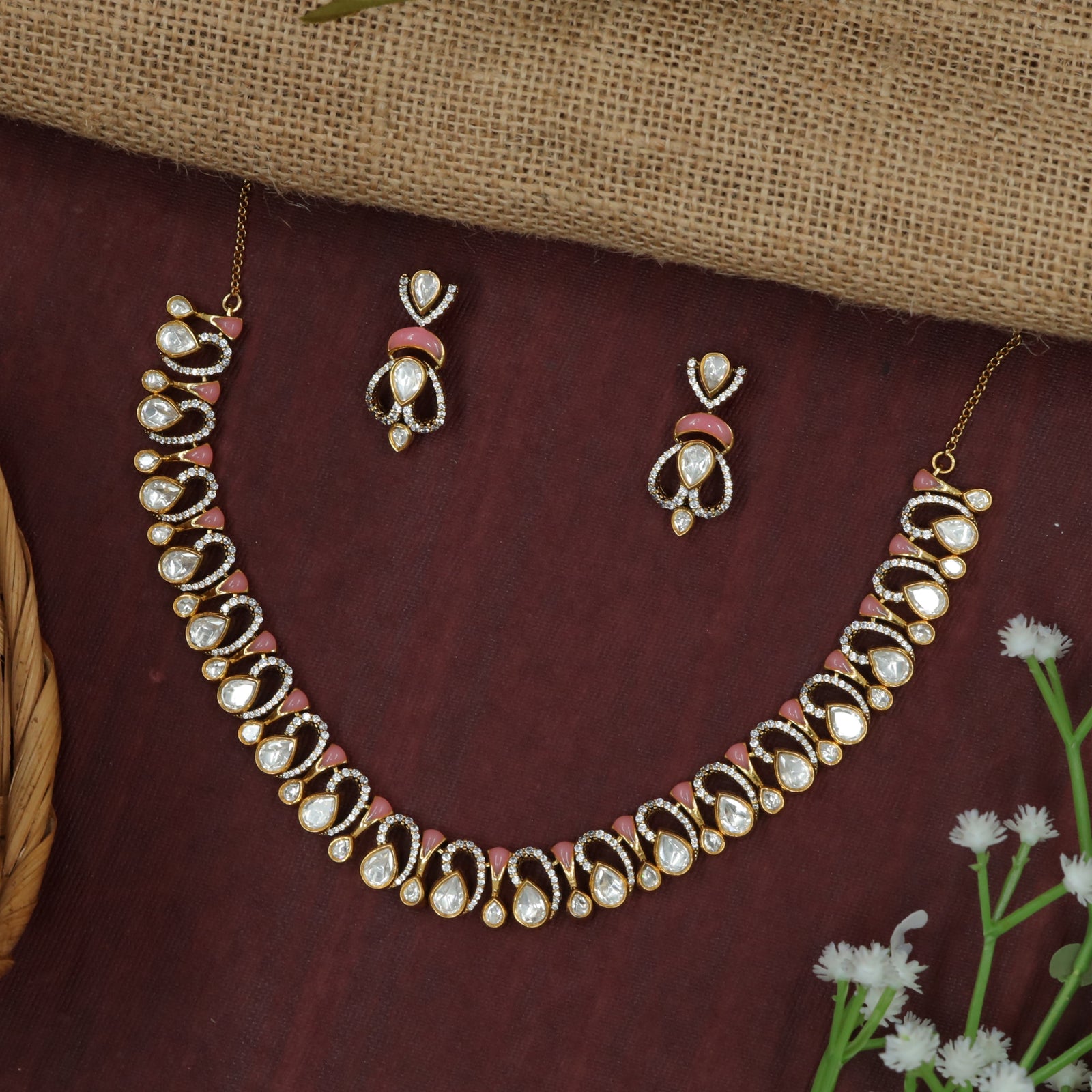 Crescent-Flow Necklace with Repeated Tear Drop Design