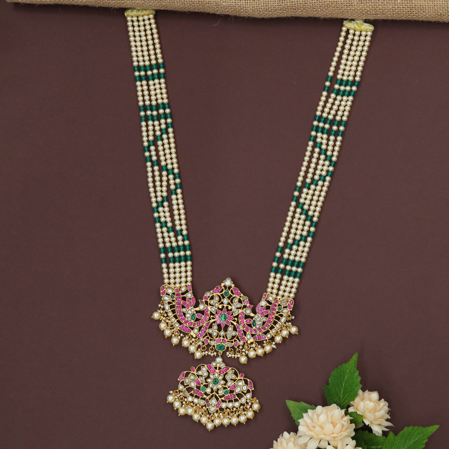 Jadau Long Haara Showcasing Bead Chains and Ornamental Pendant