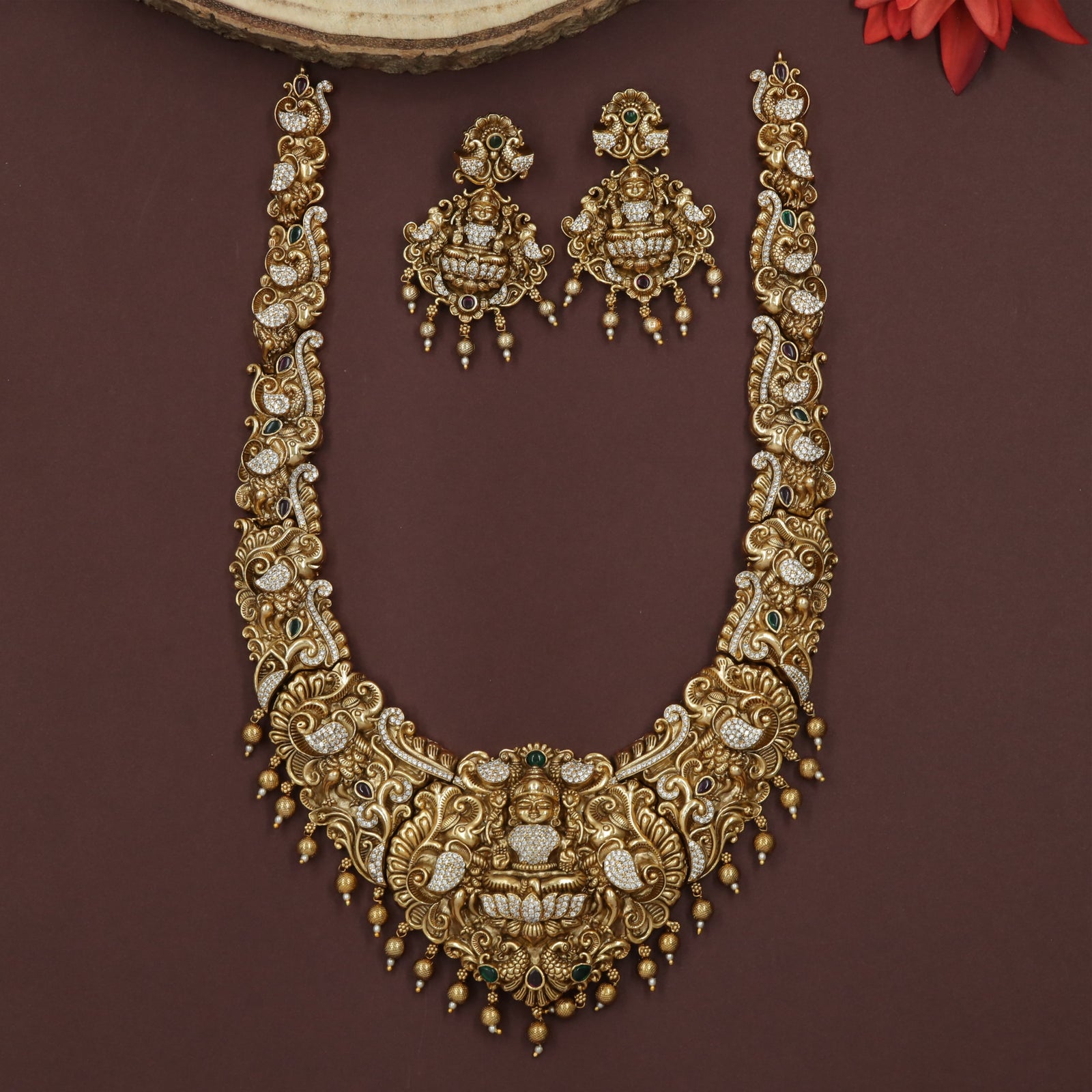 Sculpted Lakshmi Pendant with Peacock Panels and Dense Hanging Drops