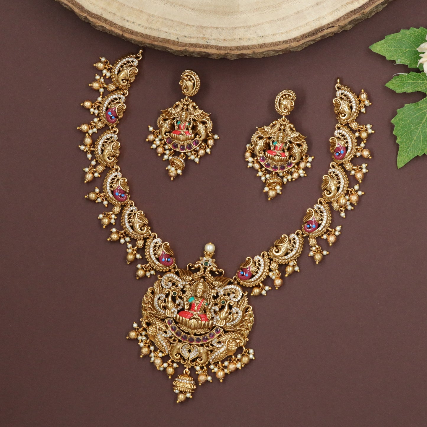 Lakshmiâ€“Ganesha Centre Disc with Repeated Ganesha Links and Peacock Motifs