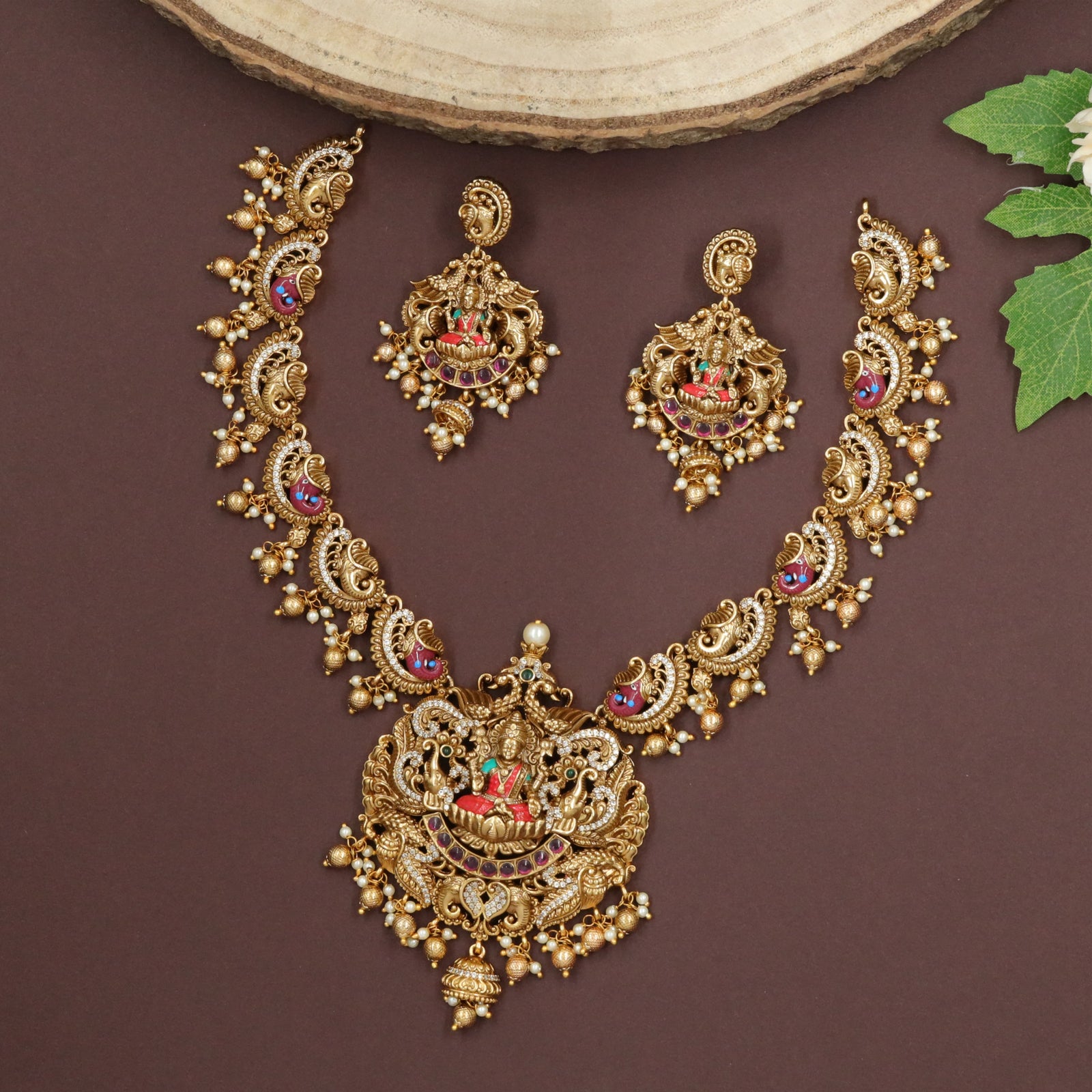 Lakshmiâ€“Ganesha Centre Disc with Repeated Ganesha Links and Peacock Motifs