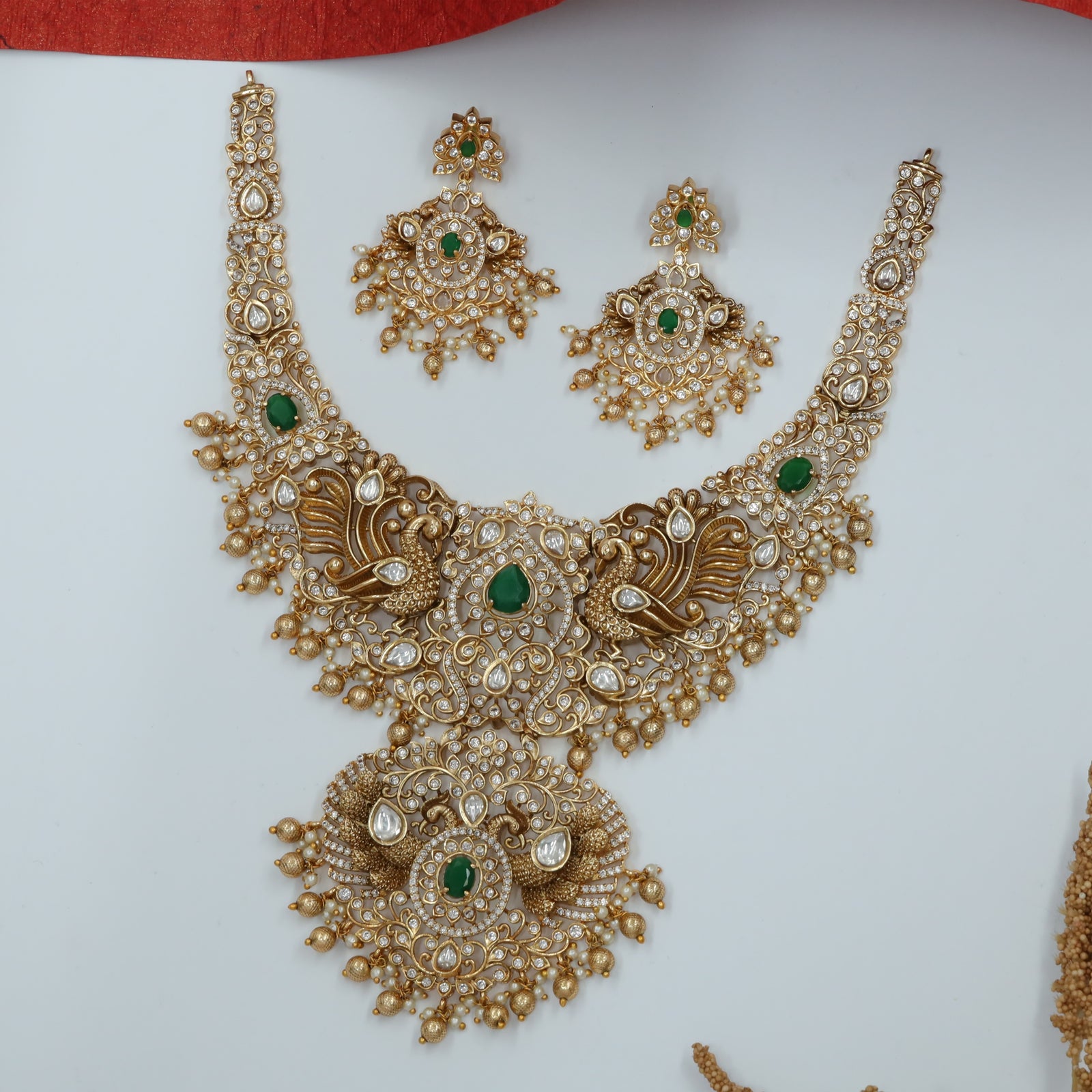 Mayura Feather Form Necklace with Layered Drop Core