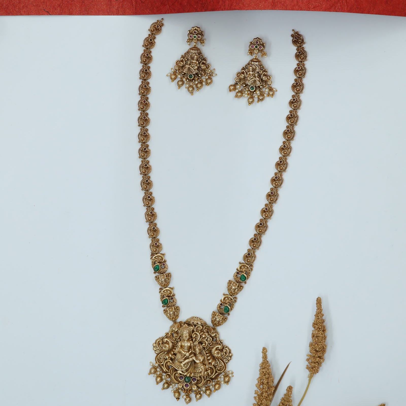 Krishna–Radhe Centre Long Haara with Elephant Relief Flow and Mayura Scrolls