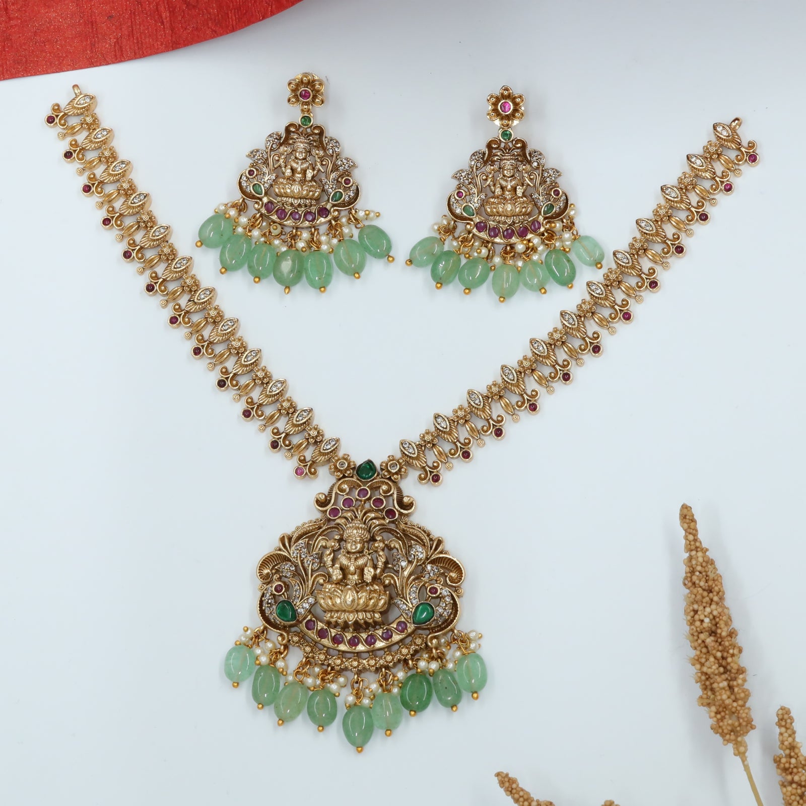 Central Lakshmi Pendant with Peacock Design and Bead Fringe Necklace
