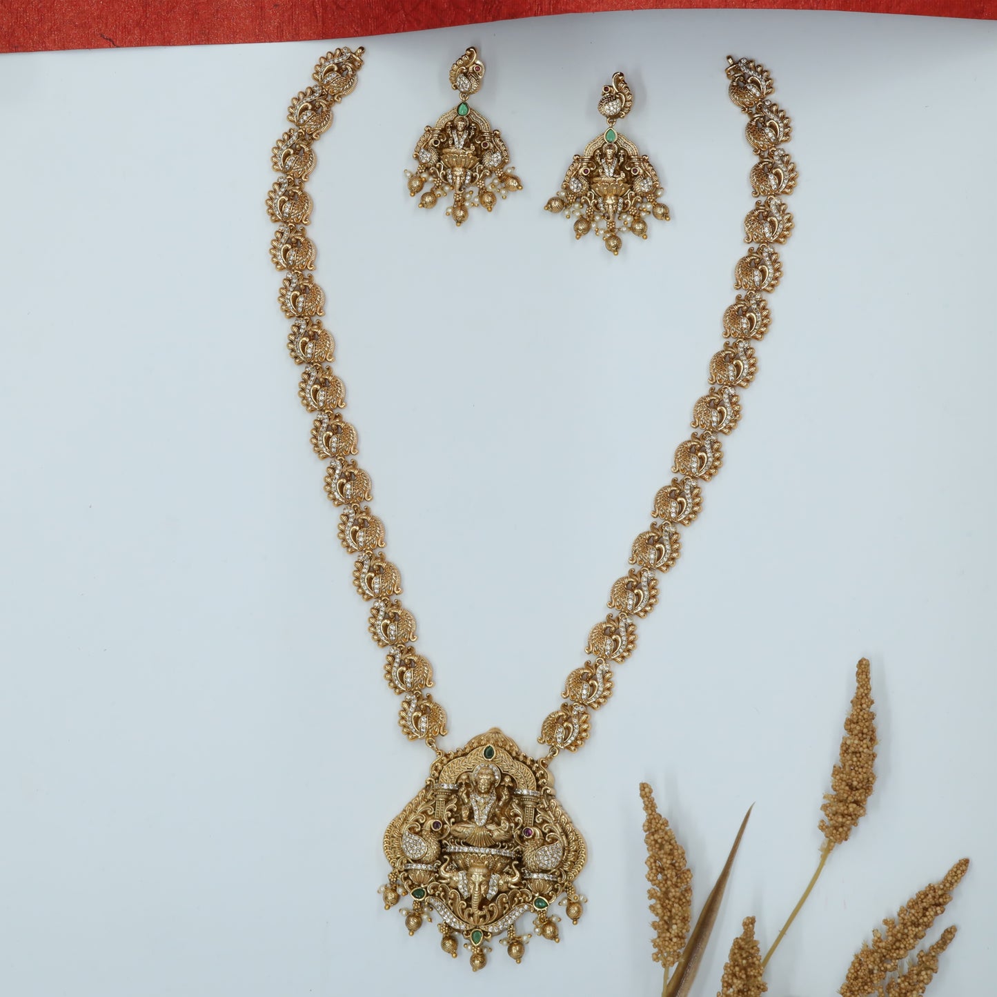 Mahalakshmi Relief Long Haara with Mayura Crest Chain and Elephant Motifs