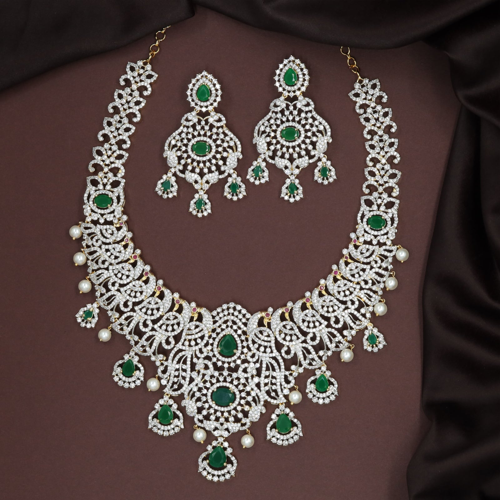 Central Peacock Pendant Construction with Curved Scroll-Link Chain Necklace