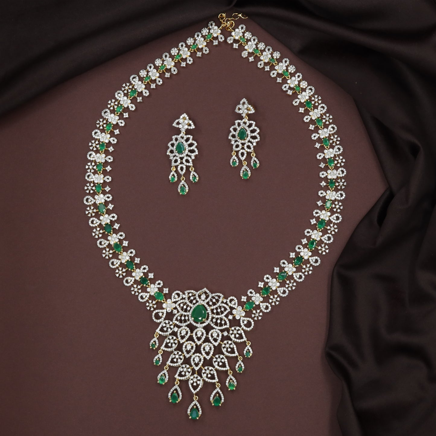Repeating Floral Stone Links Forming a Long Haara with Expanded Drop Panel