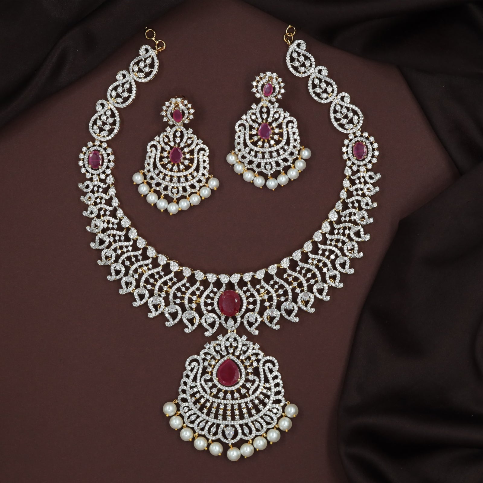 Zircon Curved Lattice Layout Featuring Central Oval Design and Pearl Fringe