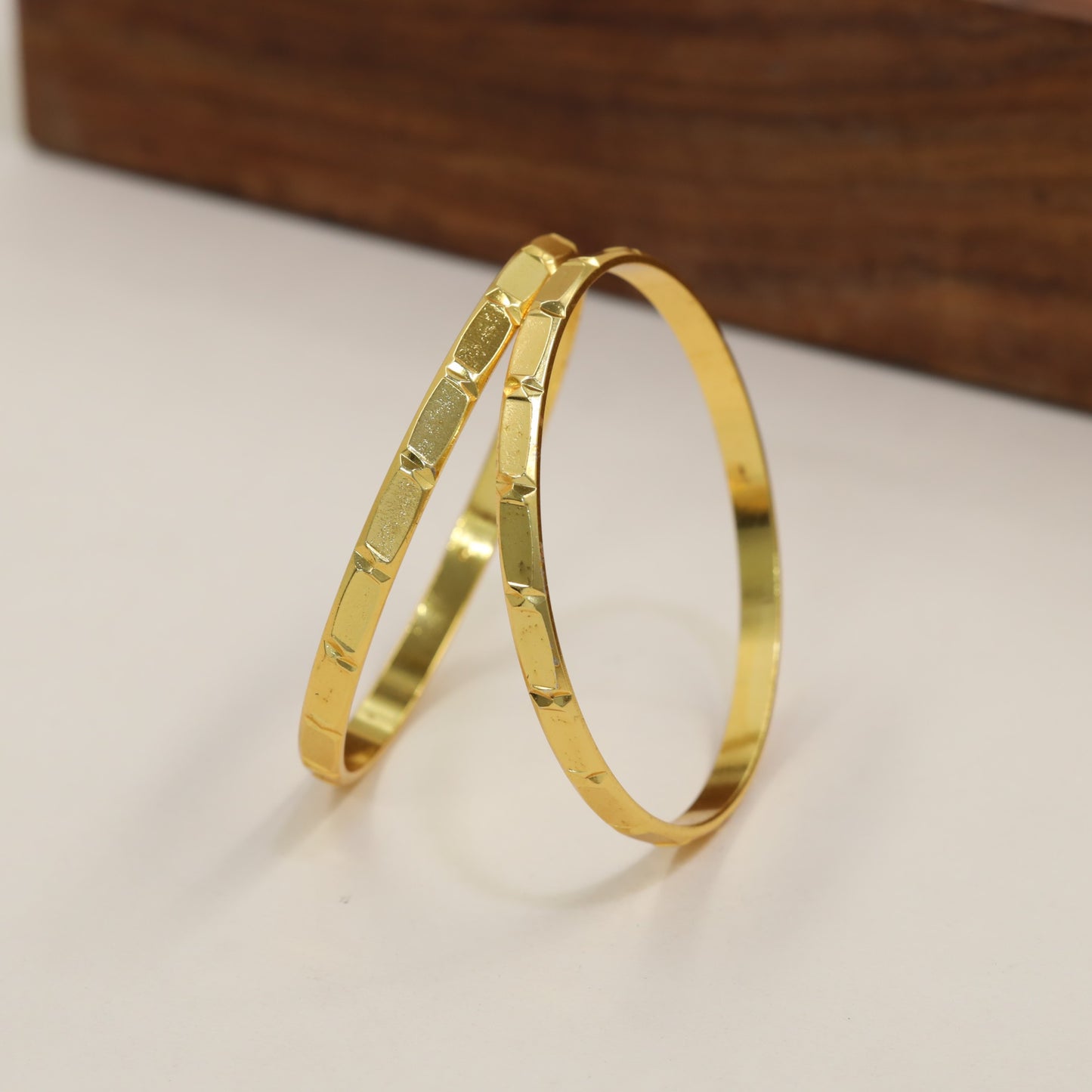 Traditional Gold Bangle With Subtle Faceted Panel Work