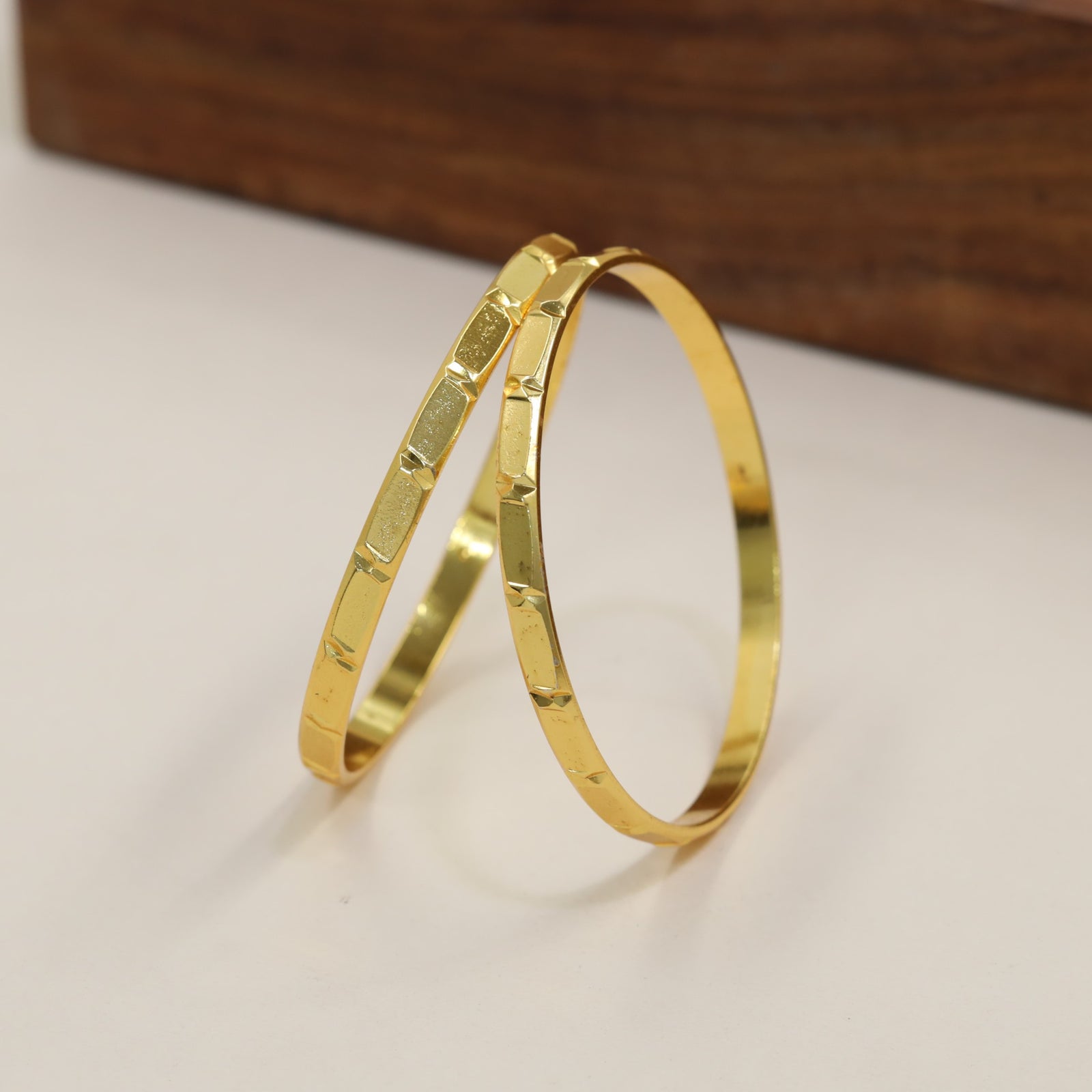 Traditional Gold Bangle With Subtle Faceted Panel Work