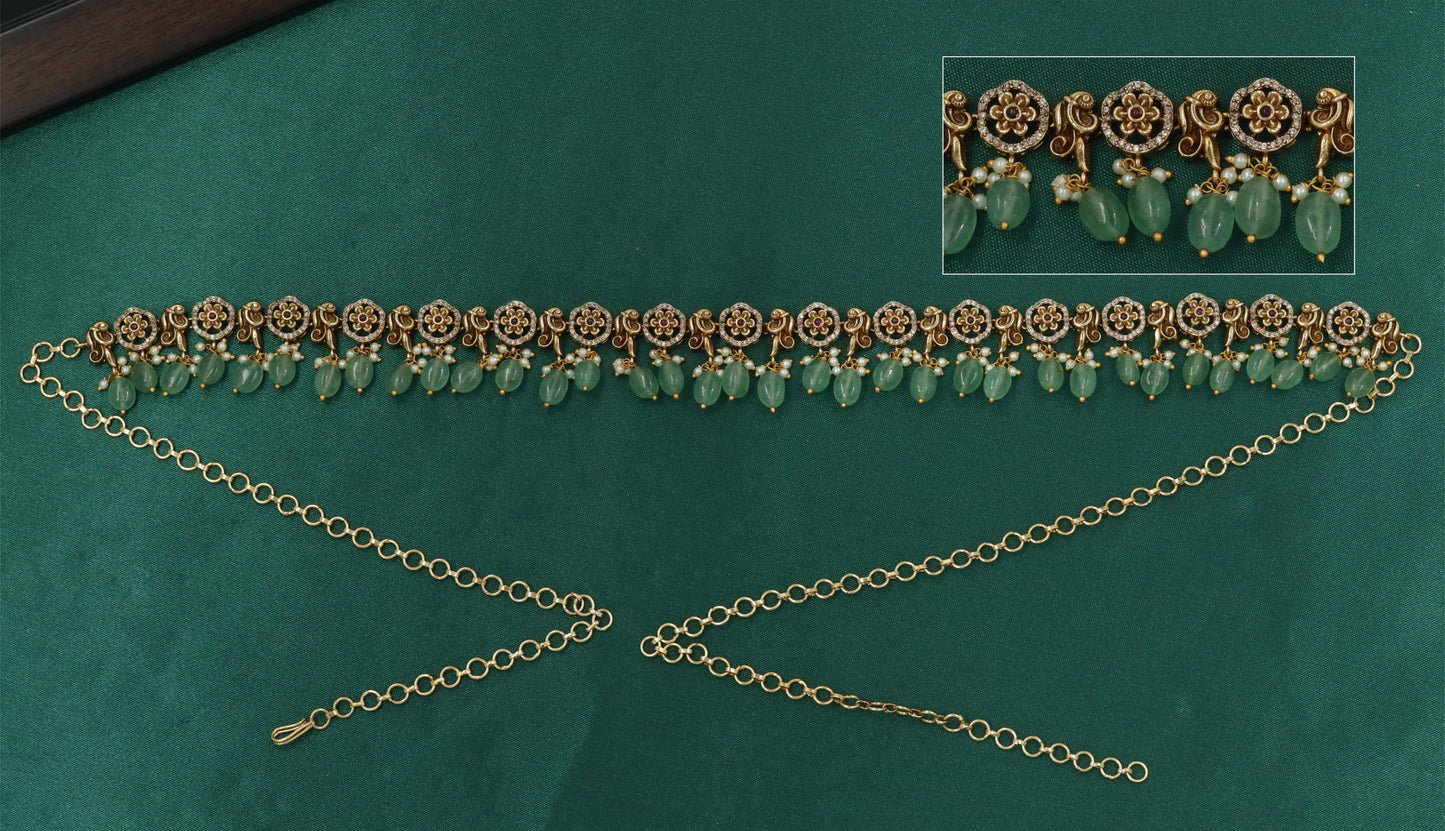Decorative Vaddanam with Round Floral Motifs and Curved Side Links