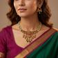 Floral Crest Drop Necklace With Teardrop Dangling Panels