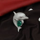 Ocean Curve Dolphin Silhouette Rhodium Brooch with Emerald Core