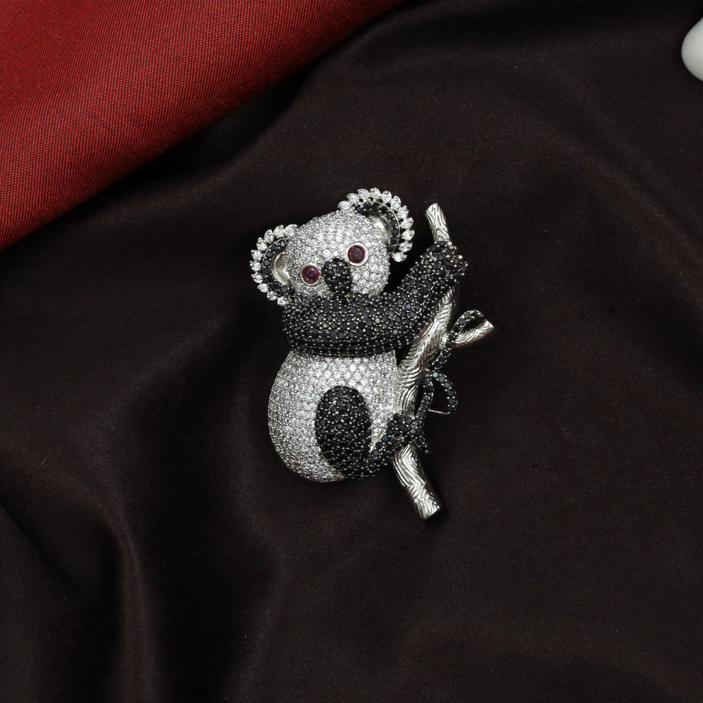 Playful Koala Silhouette Rhodium Necklace with Branch Embrace