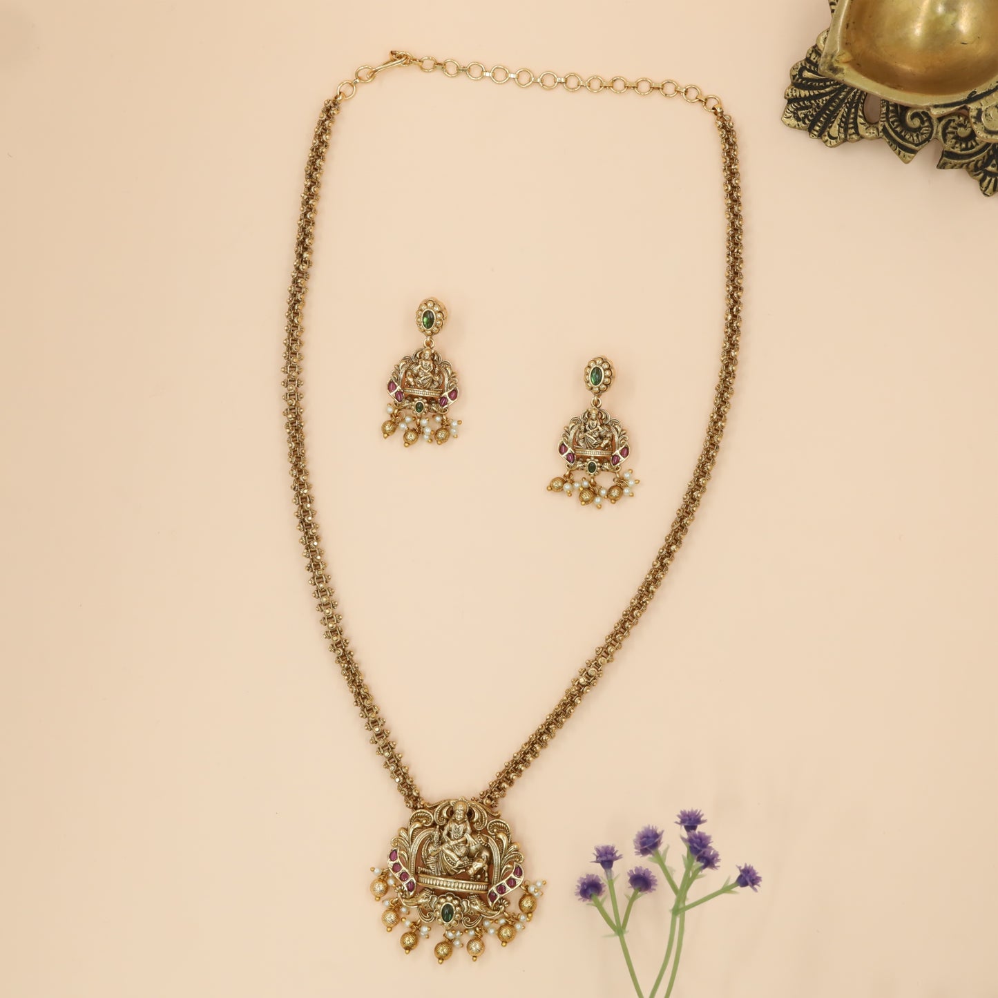 Divine Kamadhenu Lakshmi Chain with Ornate Scroll Frame