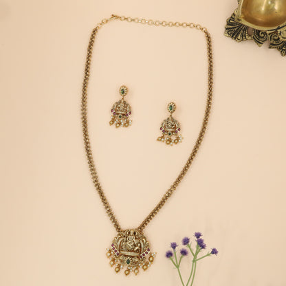 Divine Kamadhenu Lakshmi Chain with Ornate Scroll Frame