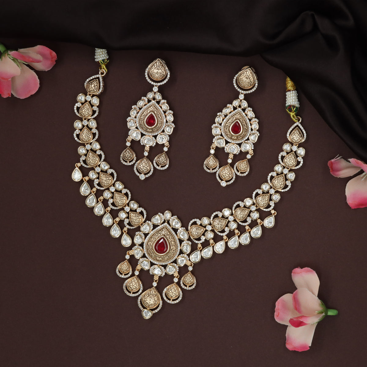 Teardrop medallion kundan necklace with engraved leaf cascade
