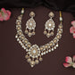 Teardrop medallion kundan necklace with engraved leaf cascade