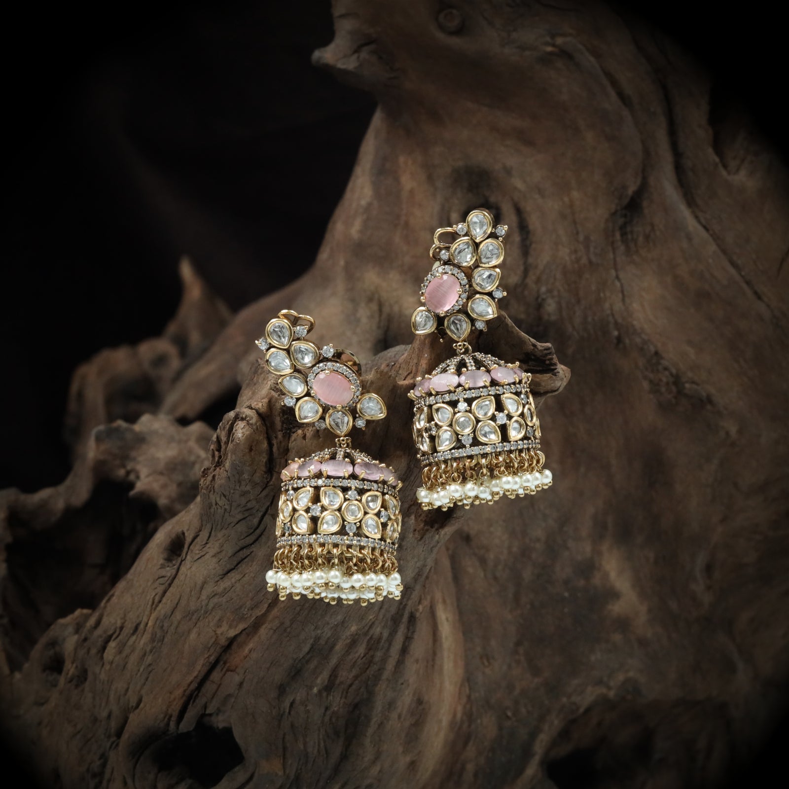 Artisan leaf cluster jumka with structured dome and chain drops