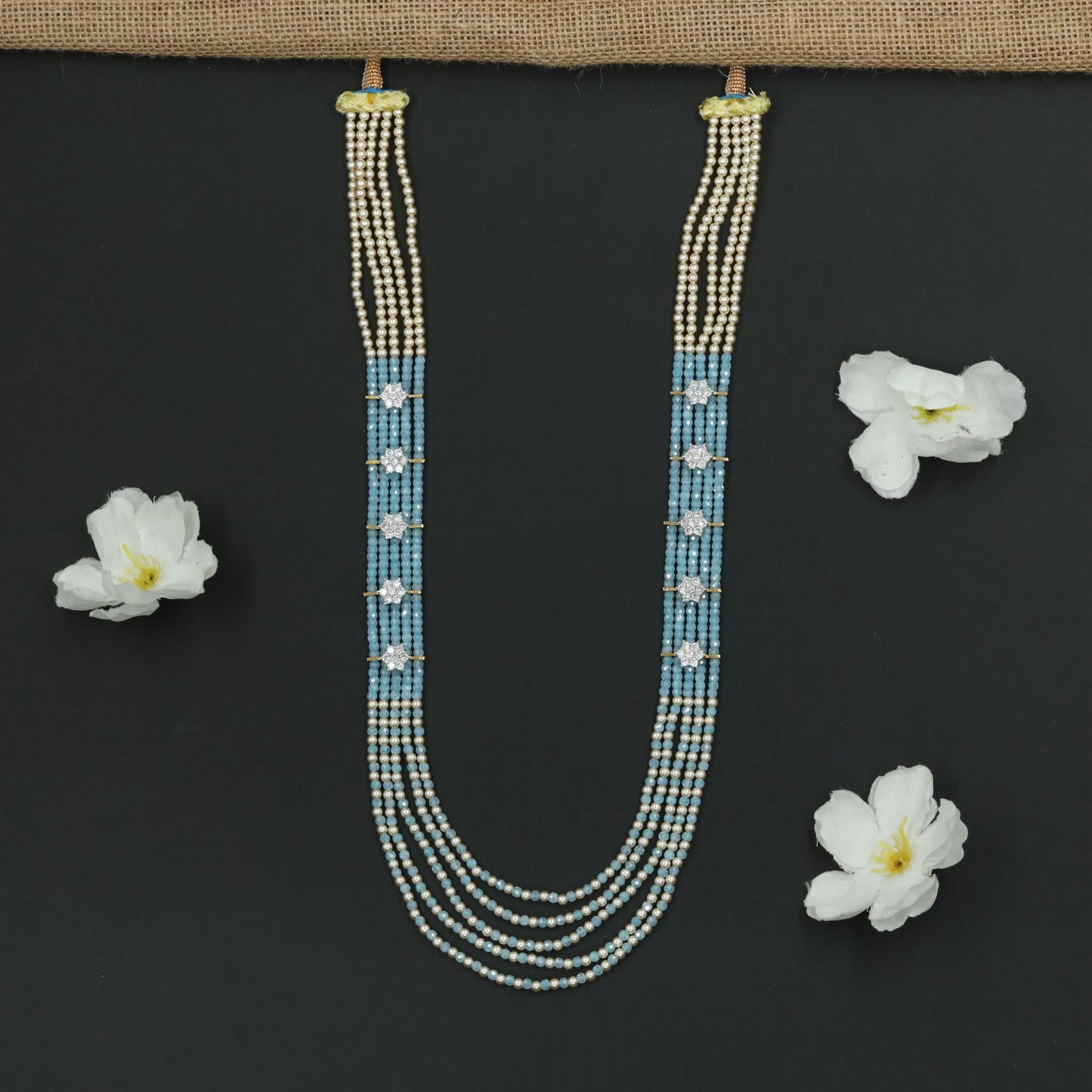 Flowing Crystal Bead Long Haara with Ornamental Flower Link Design