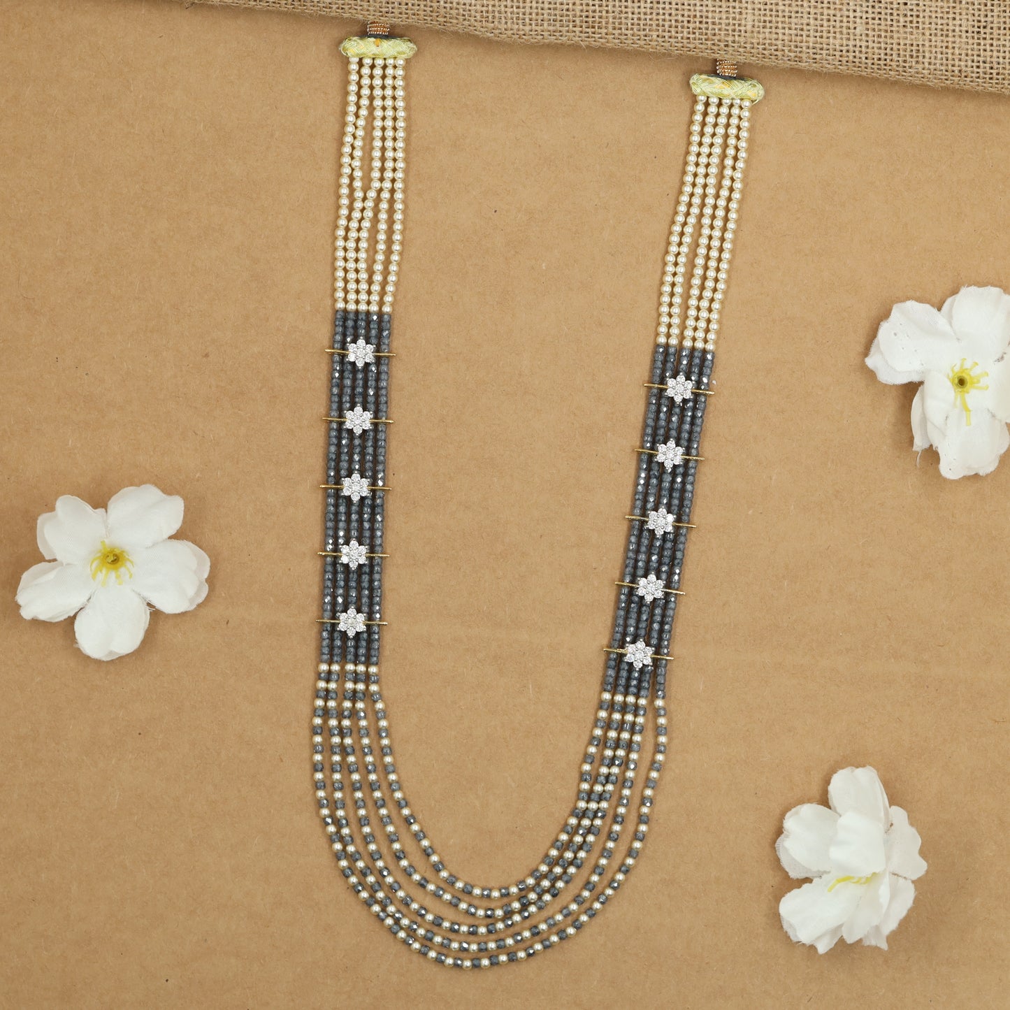 Flowing Crystal Bead Long Haara with Ornamental Flower Link Design
