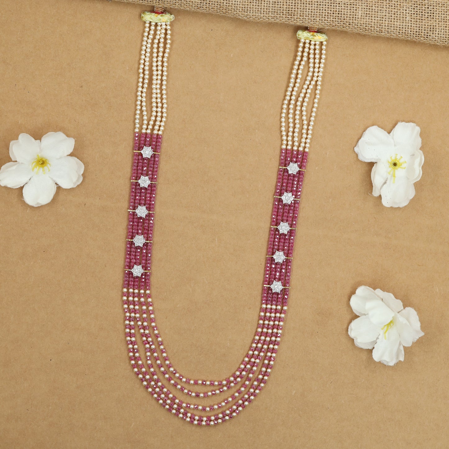 Flowing Crystal Bead Long Haara with Ornamental Flower Link Design