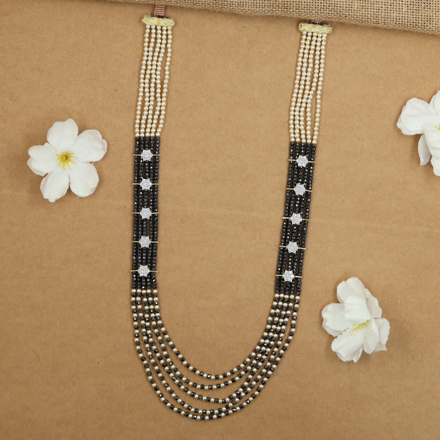 Flowing Crystal Bead Long Haara with Ornamental Flower Link Design