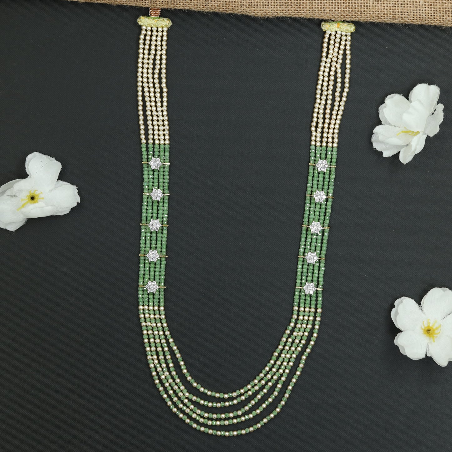 Flowing Crystal Bead Long Haara with Ornamental Flower Link Design