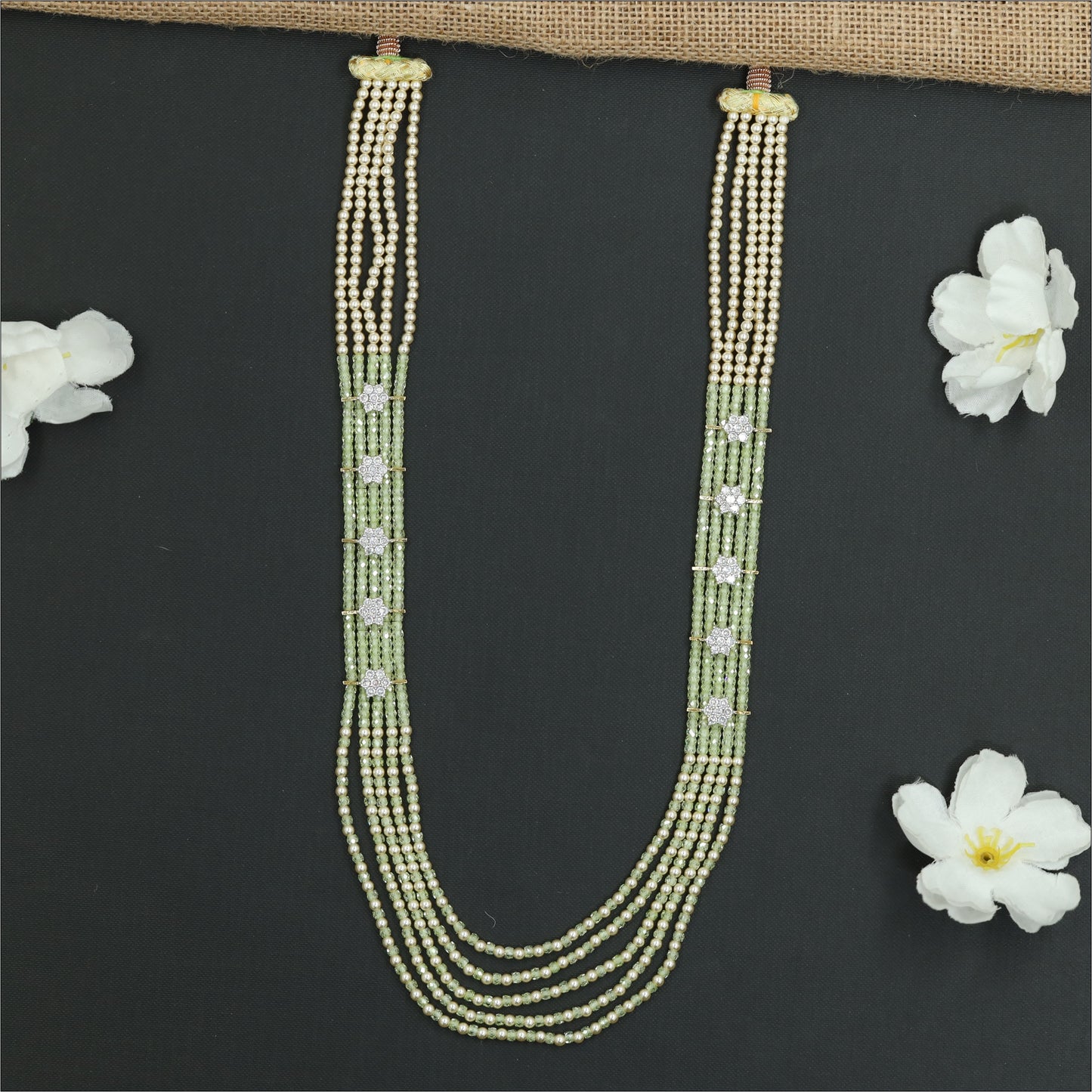 Flowing Crystal Bead Long Haara with Ornamental Flower Link Design