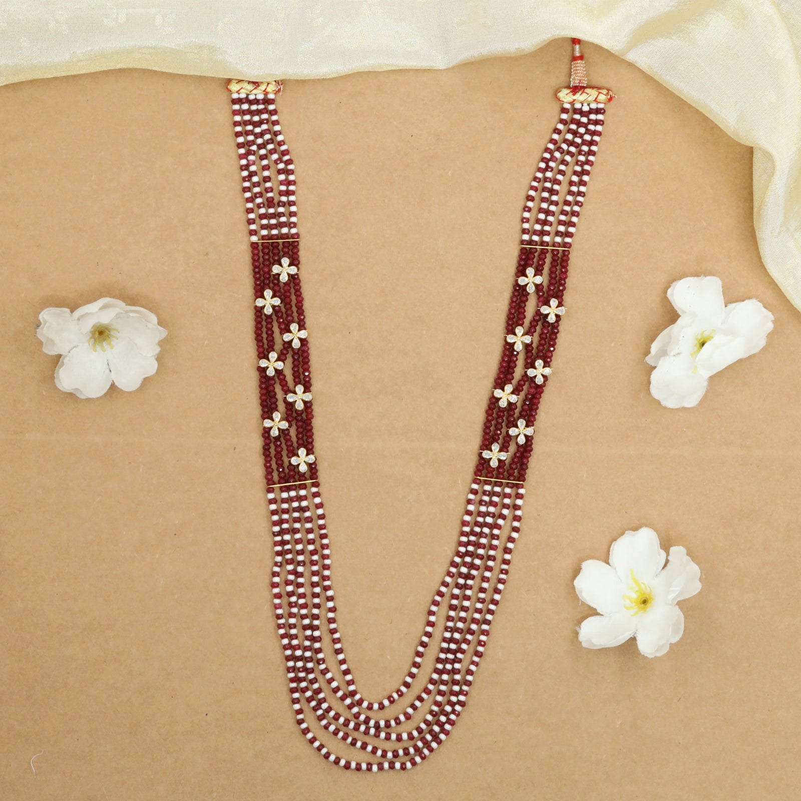 Multi Strand Crystal Bead Long Haara with Petite Flower Motifs